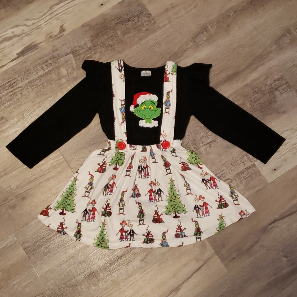 Girls holiday Grinch Christmas suspender dress.